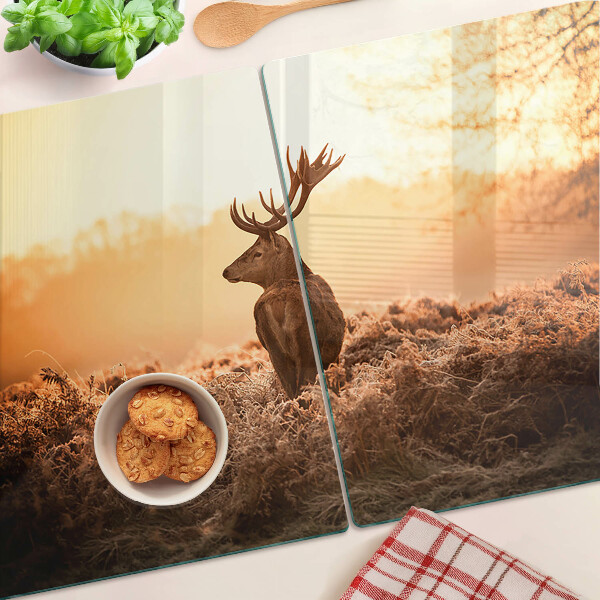 Schneidebrett Glas mit Motiv von Hirschen vor dem Sonnenuntergang