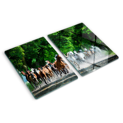 Glas-Schneidebrett mit dem Motiv galoppierender Pferde in natürlicher Umgebung
