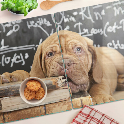 Glas Schneidebrett mit Motiv eines Hundes neben Büchern und einer Tafel