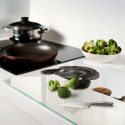 Schneidebrett mit Motiv zweier Hunde, die sich umschauen