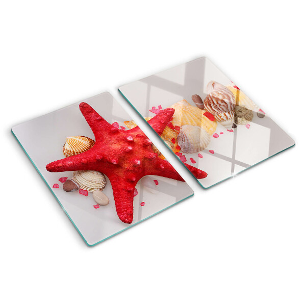 Schneidebrett glas Muscheln und Seesterne
