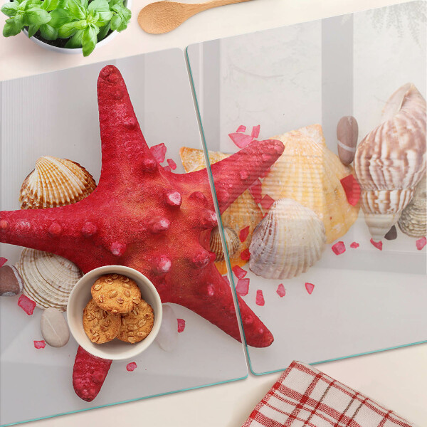 Schneidebrett glas Muscheln und Seesterne