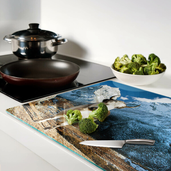 Schneidebrett mit Motiv einer Kuh in den Bergen