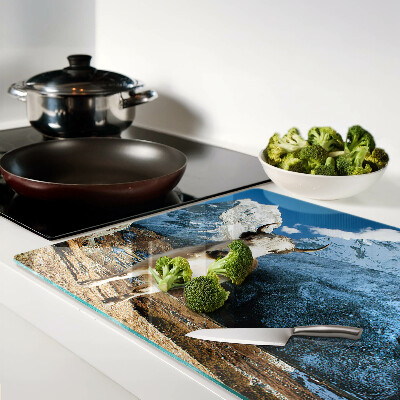 Schneidebrett mit Motiv einer Kuh in den Bergen