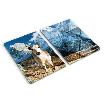 Schneidebrett mit Motiv einer Kuh in den Bergen