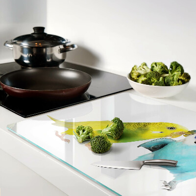 Schneidebrett Glas mit gelbem und blauem Papageienmotiv