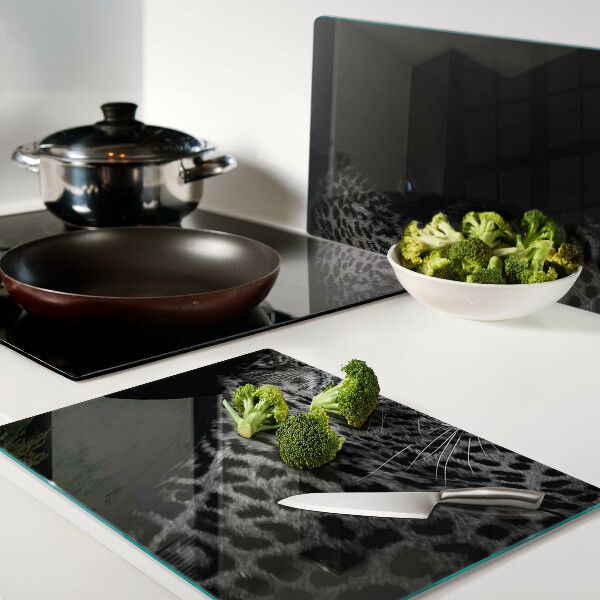 Glas-Schneidebrett mit Motiv eines linken Panthers mit blauen Augen