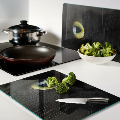 Schneidebrett mit Motiv einer schwarzen Katze mit grünen Augen