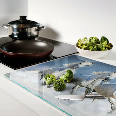 Schneidebrett galoppierende weiße Pferde