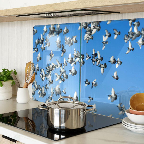 Schneidebrett Glas mit Motiv von Tauben, die am Himmel fliegen