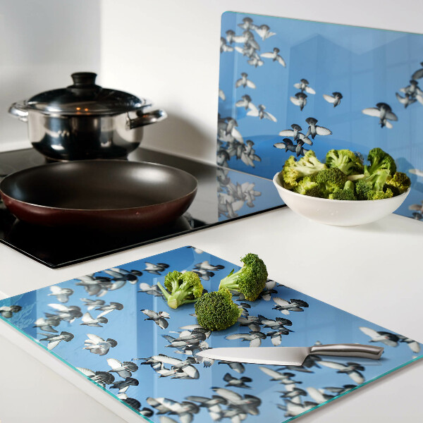 Schneidebrett Glas mit Motiv von Tauben, die am Himmel fliegen