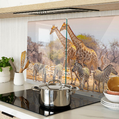 Glas-Schneidebrett mit Motiv von Zebras und Giraffen in ihrem natürlichen Lebensraum