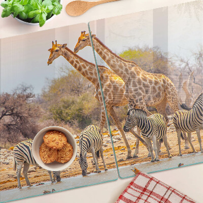 Glas-Schneidebrett mit Motiv von Zebras und Giraffen in ihrem natürlichen Lebensraum