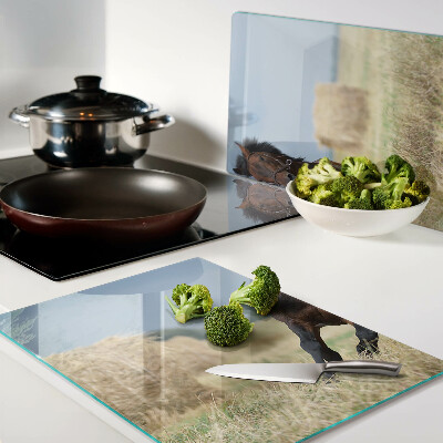 Schneidebrett mit Motiv eines Pferdes auf der Wiese