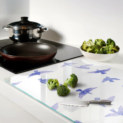 Glas-Schneidebrett mit einem Motiv aus Vögeln in Blautönen