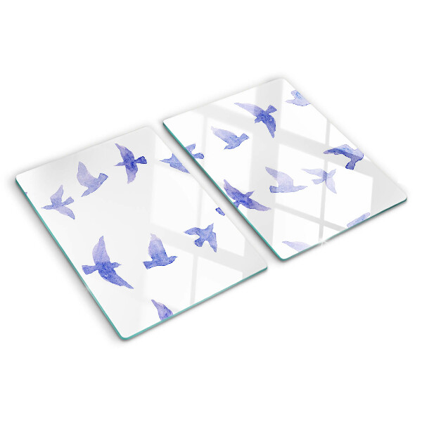Glas-Schneidebrett mit einem Motiv aus Vögeln in Blautönen