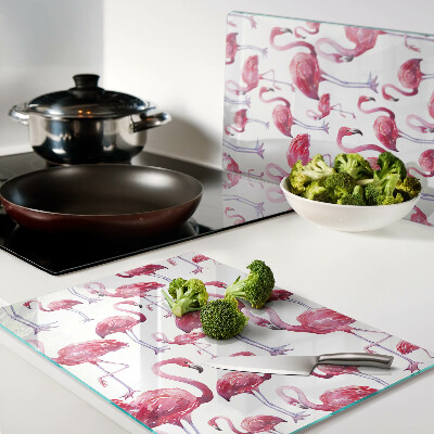 Schneidebrett mit Flamingo-Motiv vor weißem Hintergrund