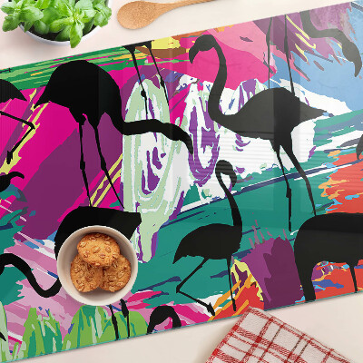 Schneidebrett Flamingos vor farbenfrohem Hintergrund