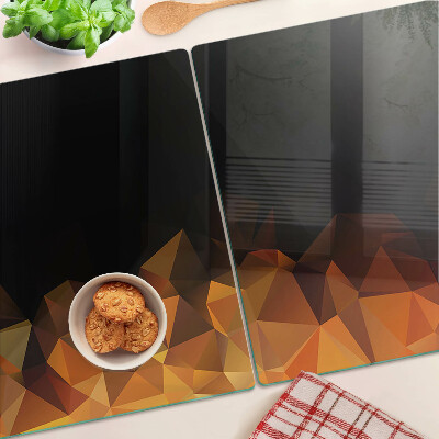 Glas-Schneidebrett mit einem Motiv brennendes Lagerfeuer im geometrischen Stil