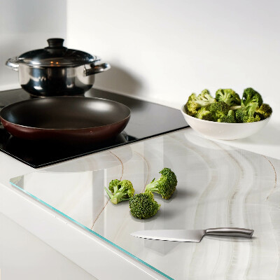 Schneidebrett mit Marmoroptik und goldenen Adern