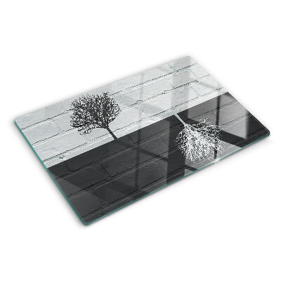 Schneidebrett glas Ein Baum vor einem Backsteinhintergrund