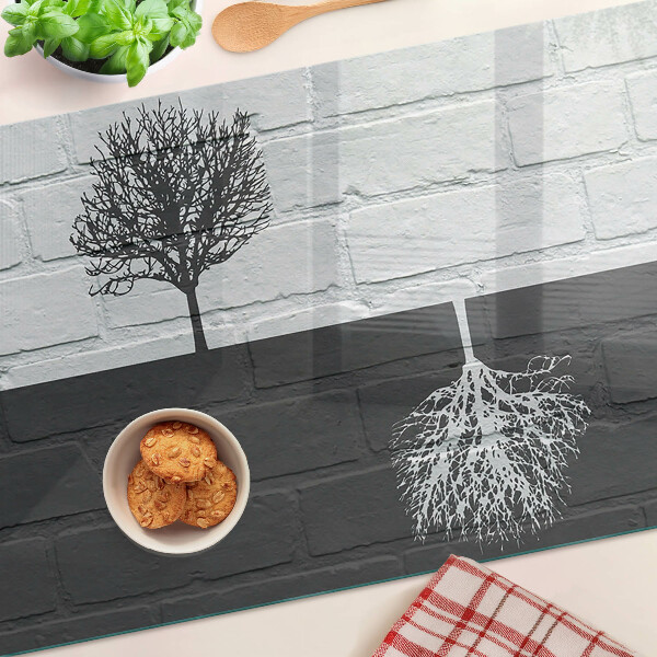 Schneidebrett glas Ein Baum vor einem Backsteinhintergrund