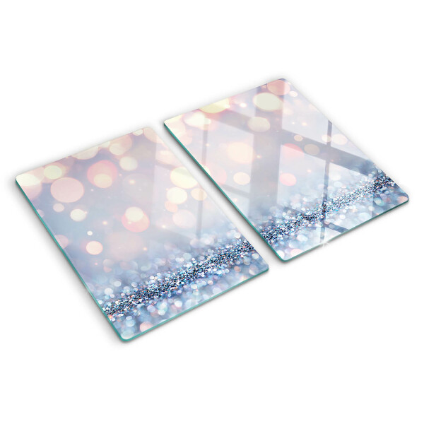 Glas-Schneidebrett mit funkelnden Lichtern und Diamantakzent