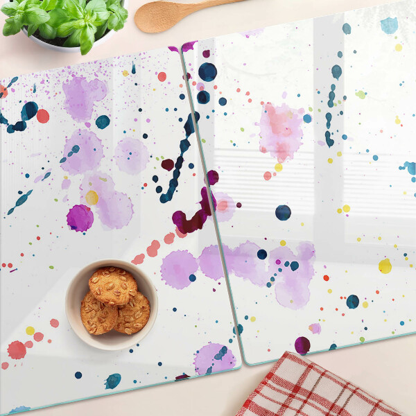 Schneidebrett mit abstraktem Farbspritzermotiv