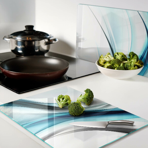 Schneidebrett Glas mit wellenförmigem Muster in Blautönen