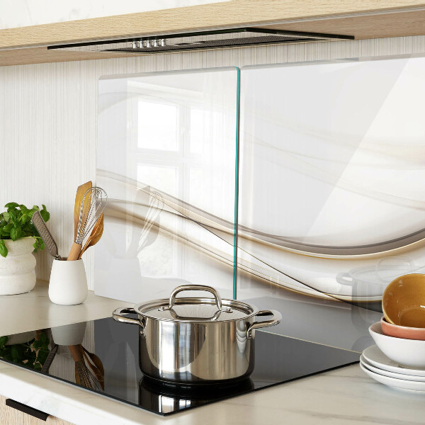 Glas-Schneidebrett mit abstrakten Wellen in Beigetönen