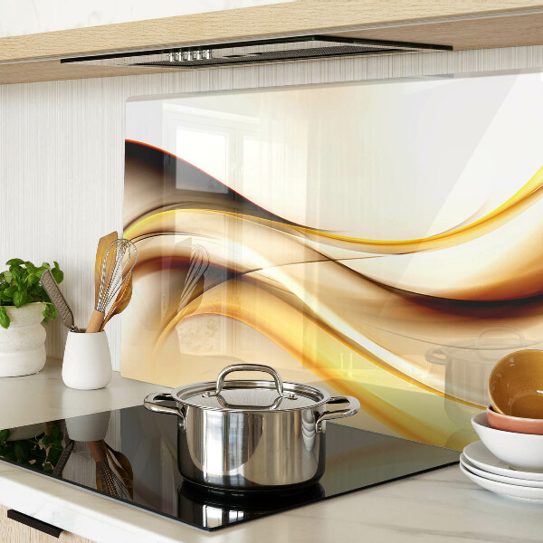 Schneidebrett Glas mit abstraktem Wellenmotiv in Goldtönen
