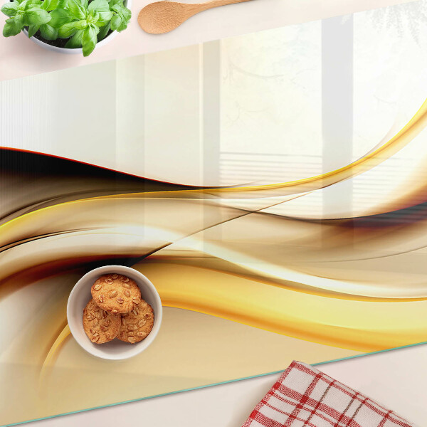 Schneidebrett glas Abstrakte Wellen in Goldtönen