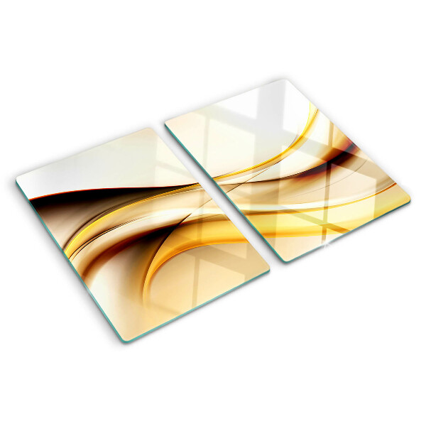 Schneidebrett Glas mit abstraktem Wellenmotiv in Goldtönen