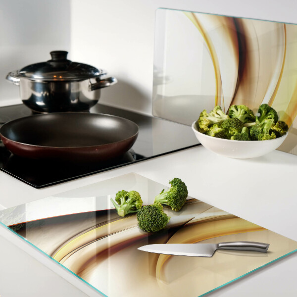 Schneidebrett glas Abstrakte Wellen in Goldtönen