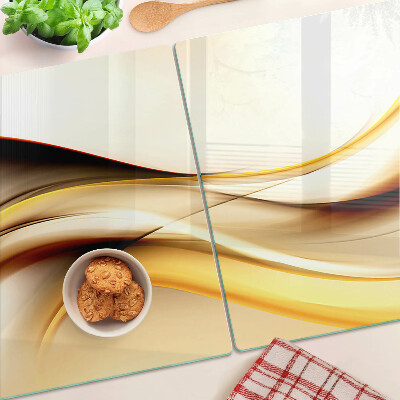 Schneidebrett glas Abstrakte Wellen in Goldtönen