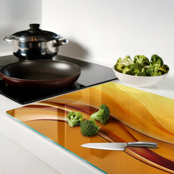 Glas schneidebrett Wellen in Goldtönen