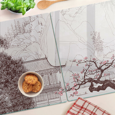 Glas schneidebrett Berglandschaft mit blühenden Bäumen