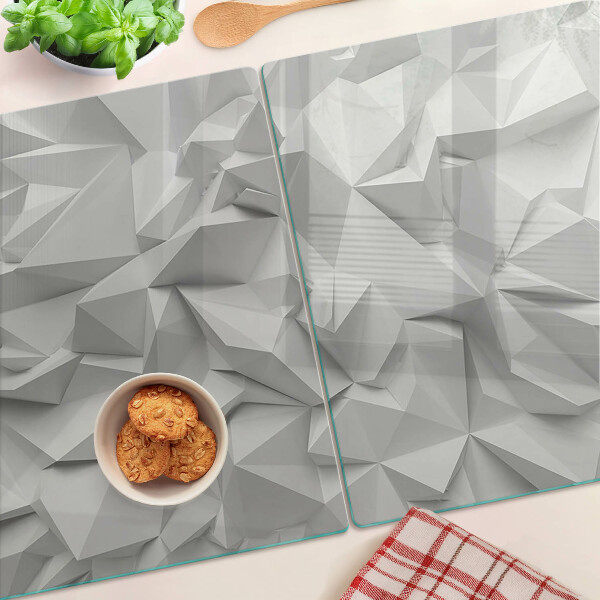 Glas-Schneidebrett mit abstraktem 3D-Muster in Grautönen