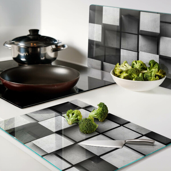 Glas-Schneidebrett mit geometrischem Muster in Grautönen