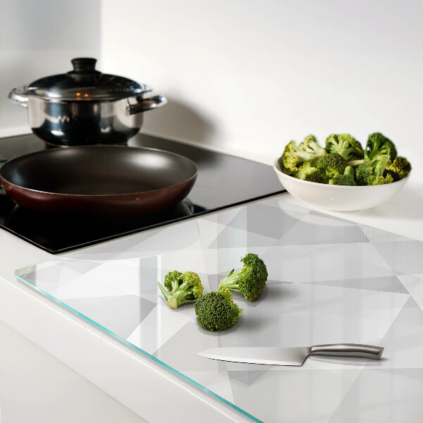 Schneidebrett mit geometrischem Motiv in Grautönen