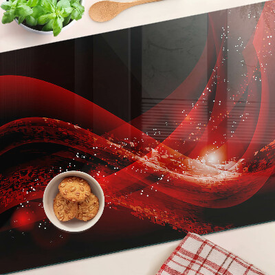 Schneidebrett mit rotem Wellenmuster und Lichteffekt