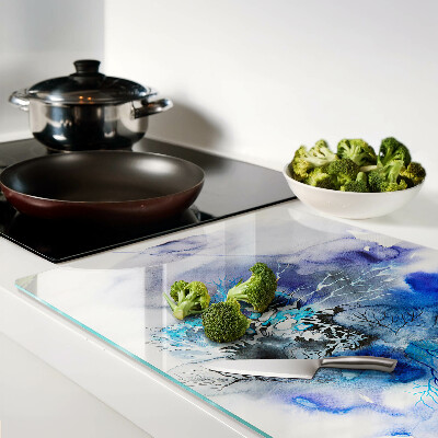 Glas-Schneidebrett mit abstraktem blauem Muster