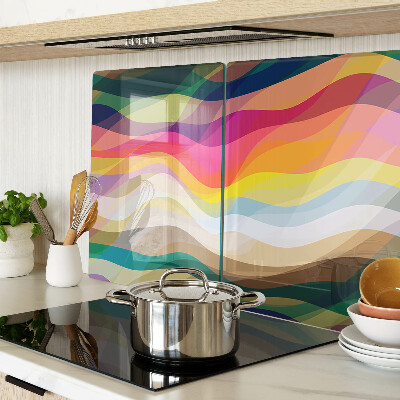 Glas-Schneidebrett mit abstrakten Farbwellen als Motiv