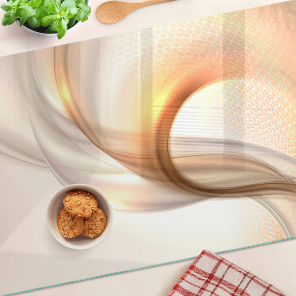 Glas Schneidebrett mit Lichtwellen in Goldtönen