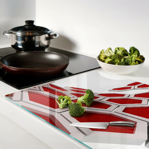 Schneidebrett Glas mit sechseckigem Motiv in Rottönen