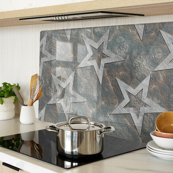 Glas schneidebrett Sterne auf strukturiertem Hintergrund