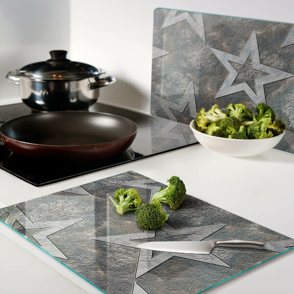 Glas schneidebrett Sterne auf strukturiertem Hintergrund