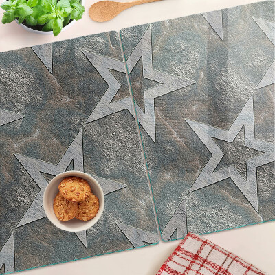 Glas schneidebrett Sterne auf strukturiertem Hintergrund