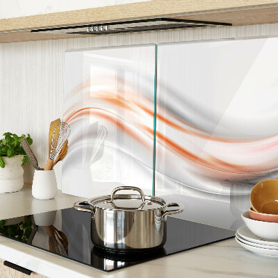 Schneidebrett mit Wellenmuster in Orange- und Grautönen