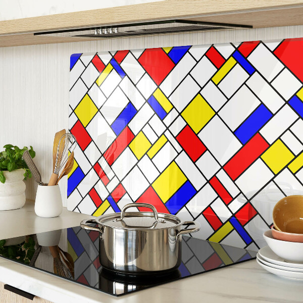 Glas-Schneidebrett mit einem geometrischen Mondrian‑Motiv